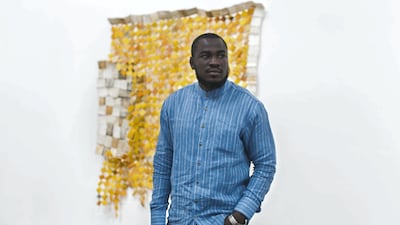 Ghanaian artist Serge Attukwei Clottey, at Lawrie Shabibi in Alserkal Avenue, where his work 'Displaced' is showing. Reem Mohammed / The National