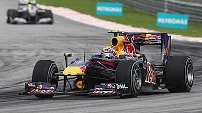 Mark Webber, in action last month at the Malaysian Grand Prix, says his Red Bull team have to be more consistent. Paul Gilham.