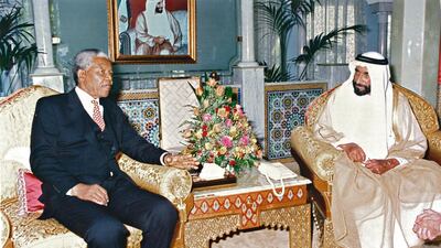 Nelson Mandela meets with the late Sheikh Zayed on a state visit in 1995. Courtesy of Al Ittihad