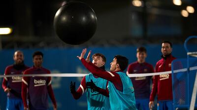 Barcelona midfielder Nico Gonzalez and defender Eric Garcia take part in a training session at Joan Gamper sports city ahead of the match against Sevilla. EPA