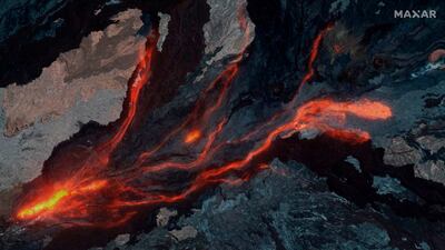 Lava flows from Mauna Loa, the world's biggest active volcano, as it erupts for the first time in 38 years, posing a threat to the people of Hawaii's Big Island. AP