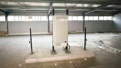 A charging station for electric cars in the palace garage, which is now empty