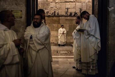 Christian clergymen gather before a memorial mass for Pope Francis at the Church of the Holy Sepulchre in Jerusalem, on April 23. AFP
