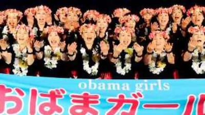 The hula-dancing group Obama Girls shout "Yes we can!" during a rally to support the US Democratic presidential hopeful Barack Obama in the Japanese city of Obama.