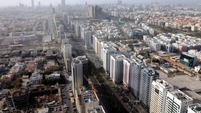 A reader reports that blocks of new apartment towers are sending rents sharply downward in Abu Dhabi.