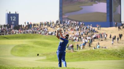 Ian Poulter of Europe plays a shot on the 12th. Getty Images