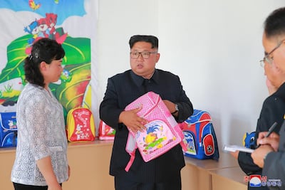 Kim Jong-un visits the Chungjin bag factory. KCNA via Reuters