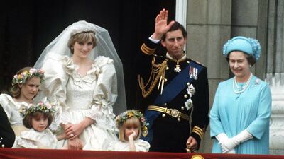 Prince Charles and Princess Diana with the queen on their wedding day in 1981. Getty