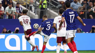 France defender Lucas Digne fouls Sppain's Lamine Yamal to give away a penalty. AFP