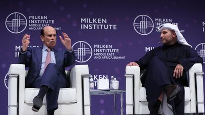 Michael Milken, Chairman of the Milken Institute, and Khaldoon Al Mubarak, right, chief executive of Mubadala Investment Company, speak during the 2020 Milken Institute Middle East and Africa Summit at St Regis Saadiyat Island Resort in Abu Dhabi. EPA