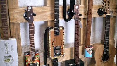 Guitars made from cigar boxes by Howlin' Rooster. Reem Mohammed / The National