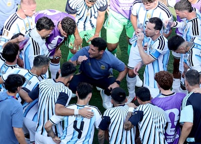 Argentina's head coach Lionel Scaloni talks to his players during a hydration break in World Cup 2026 final against Spain in New Jersey on July 19. Hydration breaks have become another unpopular addition to the modern game. EPA