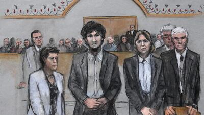 A sombre-looking Tsarnaev stood with his hands folded, his head slightly bowed, as he learned his fate, sealed after 14 hours of deliberations over three days. (Jane Flavell Collins via AP)