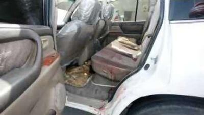 Bloodstains in the car that was used to drive Ali Hassan to hospital.