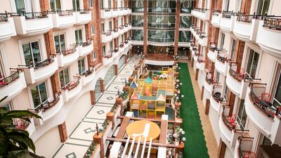 The central atrium is a stark contrast to the exterior.