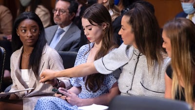 US gymnasts from left, Simone Biles, McKayla Maroney, Aly Raisman and Maggie Nichols, arrive to testify during a Senate Judiciary hearing about the Inspector General's report on the FBI's handling of the Larry Nassar investigation on Capitol Hill in September. AP