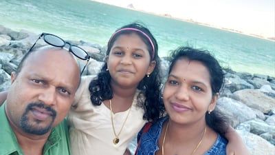 Soumya Devi, her husband Hari Prasad and their elder daughter Bhadra before Soumya and her daughter tested positive for Covid-19. Courtesy: Hari Prasad