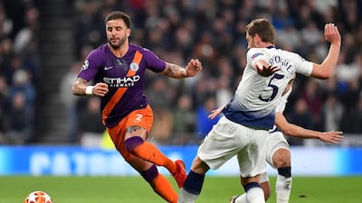 Manchester City's Kyle Walker is tackled by Tottenham's Jan Vertonghen. Getty Images