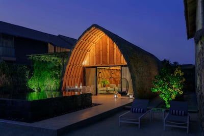 All villas at Anantara World Islands Dubai Resort have thatched Thai-style roofs. Photo: Anantara World Islands