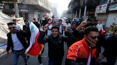 Iraqi protesters chant slogans during a demonstration in Baghdad's al-Rasheed street near al-Ahrar bridge. AFP