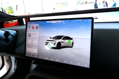 An Avatar instructor delivering tips and advice from a 15-inch touchscreen. Victor Besa / The National