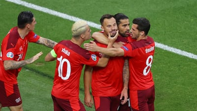 June 20, Group A: Switzerland 3-1 Turkey. Reuters