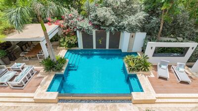 The pool and sundeck. Courtesy LuxuryProperty.com