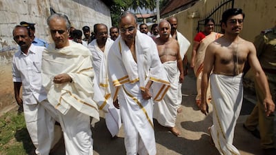 The traditional sarong-like wrap for men known variously as a dhoti, veshti or mundu is widely worn in India but deemed unacceptable attire in many establishments and institutions. Danish Siddiqui / Reuters