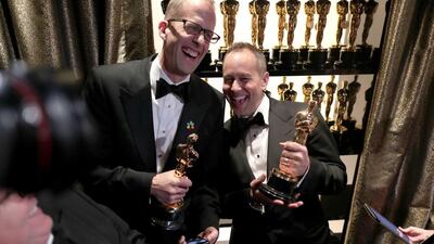Pete Docter and producer Jonas Rivera winners of the Best Animated Feature Film award for Inside Out backstage. AFP
