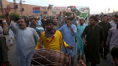 Mr Khan's arrest earlier this week sparked a wave of protests across the country. AP
