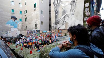 People gather in Naples to mourn the death of Diego Maradona. Reuters