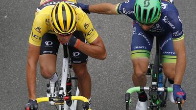 The yellow jersey wearer and leader of the race, BMC Racing team rider Greg Van Avermaet of Belgium (L) is seen with Orica-BikeExchange team rider Michael Matthews of Australia (R) during Stage 8 of the 103rd Tour de France cycling race over 184km between Pau and Bagneres-de-Luchon, France, 09 July 20 16. Yoan Valat / EPA