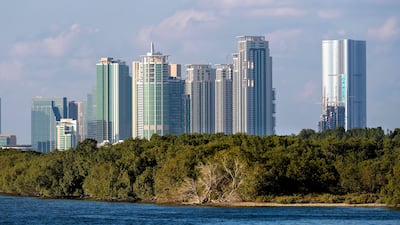 Al Reem Island, Abu Dhabi. The city, and Dubai, will be partly cloudy at times on Monday. Victor Besa / The National