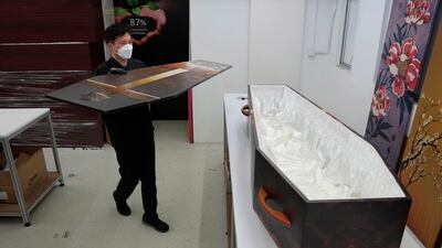 The company said its cardboard coffins, when burnt during a cremation, emit 87 per cent less greenhouse gas than those made of wood or wood substitutes.