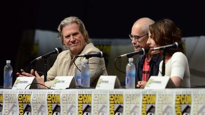 Jeff Bridges, left, Sergey Bodrov, centre, and Antje Traue attend the Seventh Son panel on Day 4 of Comic-Con International. Jordan Strauss / Invision / AP