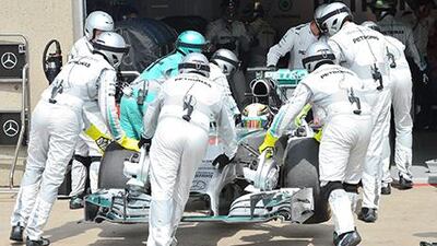 Mercedes driver Lewis Hamilton is pushed into the garage after being forced to retire at the Canadian Grand Prix on Sunday. Ryan Remiorz / AP Photo