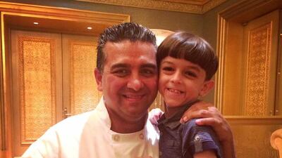 A handout photo of Abdulla Al Mansouri, age 7, with the Cake Boss (Courtesy: Khawla Barley)