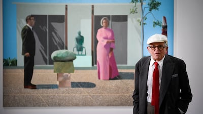 The artist with his painting Fred and Marcia Weisman at the Pompidou Centre in Paris in 2017. AFP