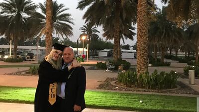 Ghena Aswad, left, pictured here with her father, Saad, landed at Abu Dhabi International Airport on May 13. Courtesy - Ghena Aswad