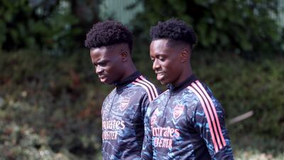Arsenal's Bukayo Saka, left, and Albert Sambi Lokonga during training. PA