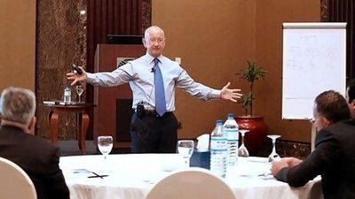 Bill Humphreys addresses a conference in Abu Dhabi last month on how to manage a family enterprise. Fatima Al Marzooqi / The National