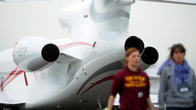 A Dassault Falcon airplane is moved on the tarmac at the Paris International Air Show. Antoine Antoine for The National