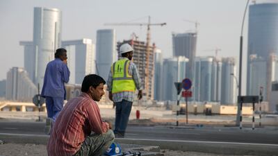 A construction worker rests at the end of his shift on Reem Island in 2014. Silvia Razgova / The National