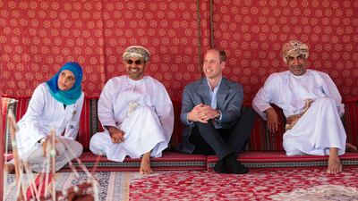 Britain's Prince William meets with officials from Oman's Ministry of Fisheries during a visit to Muscat. REUTERS