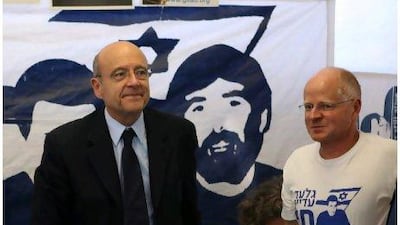The French foreign minister Alain Juppé stands next to Noam Shalit, father of the abducted Israeli soldier Gilad Shalit, during his visit to the family's protest tent, outside Prime Minister Benjamin Netanyahu's residency in Jerusalem last week. Sergeant Shalit. who also holds French nationality, was captured 1803 days ago by Hamas-allied militants in the Gaza Strip.