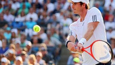 Andy Murray returns a shot from from Feliciano Lopez during their singles clash at the 2012 US Open.