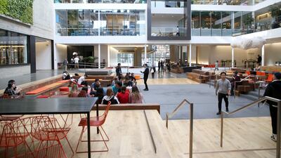 Airbnb’s office in San Francisco has spaces divided into 16 identical neighbourhoods, with each housing a meeting room, phone rooms and large communal work tables. Photo: Getty Images