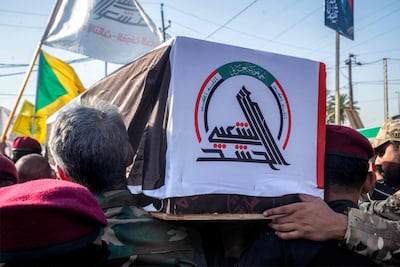Mourners carry one of the bodies of members of Popular Mobilisation Forces (PMF). AFP