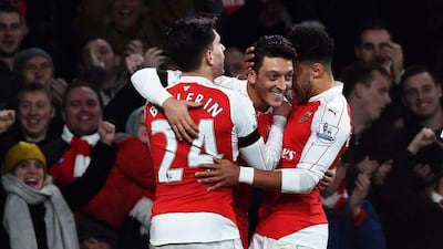 Arsenal enter 2016 as league leaders and are widely fancied to end their 12-year wait for the title. Will Oliver / EPA