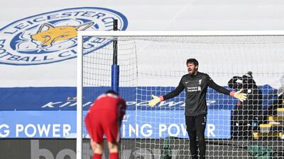 Alisson of Liverpool reacts after conceding a third goal. Getty
